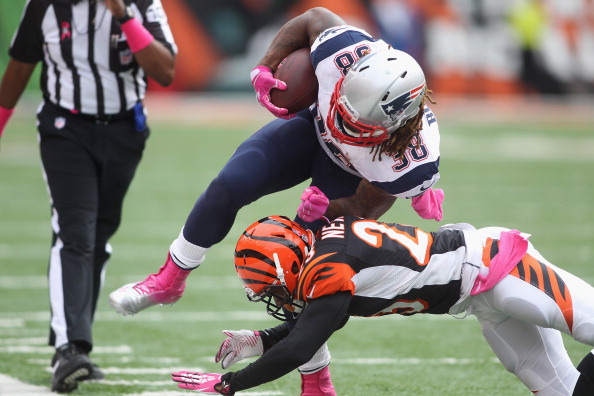 CINCINNATI, OH - OCTOBER 06:  Terence Newman #23 of the Cincinnati Bengals tackles Brandon Bolden #38 of the New England Patriots during their game at Paul Brown Stadium on October 6, 2013 in Cincinnati, Ohio.  The Bengals defeated the Patriots 13-6.  (Photo by John Grieshop/Getty Images)