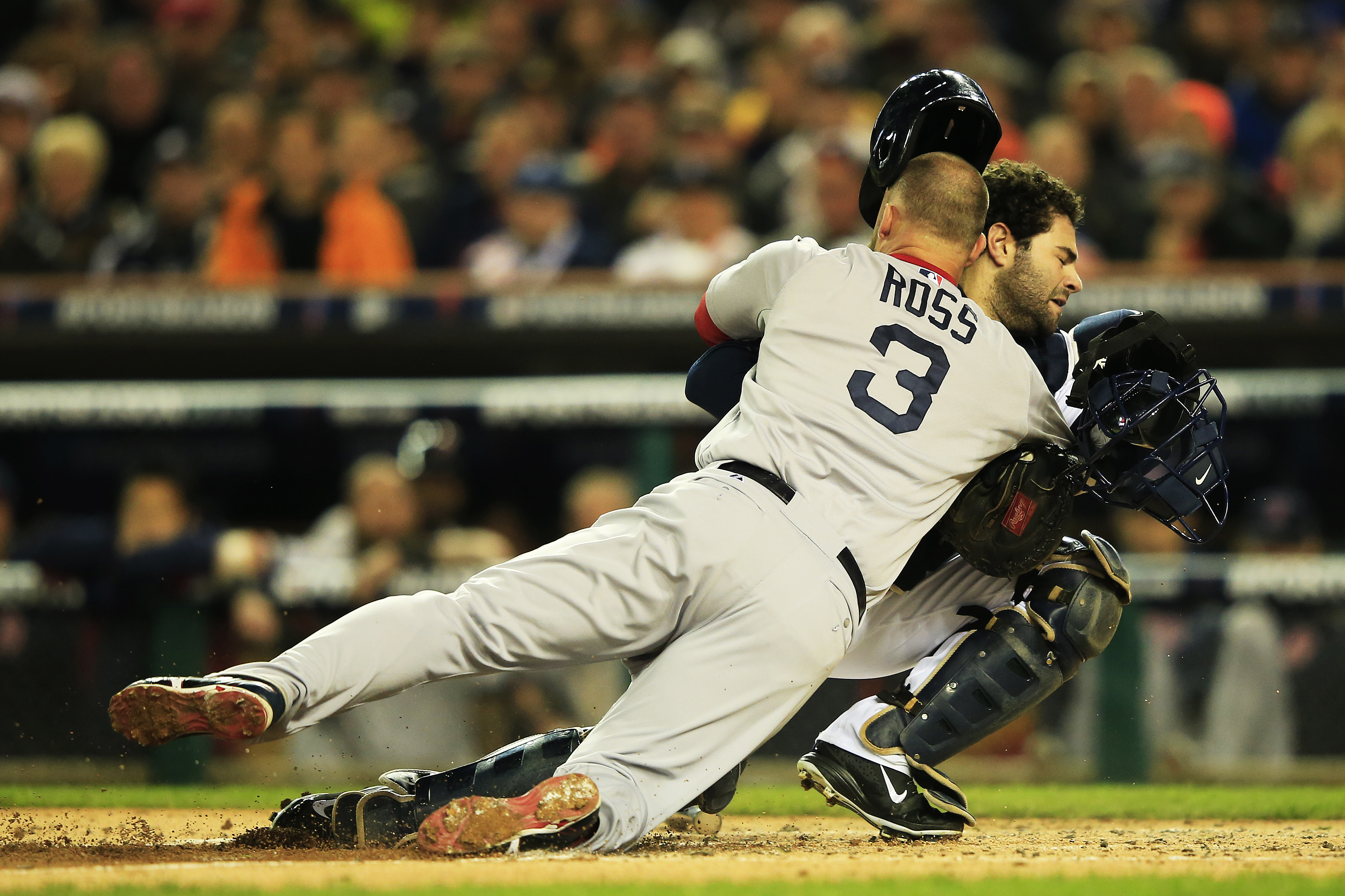 Red Sox catcher David Ross collides with Tigers catcher Alex Avila at home plate during ALCS Game 5. (Photo by Jamie Squire/Getty Images)