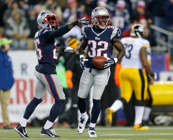 FOXBORO, MA - NOVEMBER 3: Devin McCourty #32 of the New England Patriots celebrates his interception with Kyle Arrington #25 during a game with Pittsburgh Steelers in the second half at Gillette Stadium on November 3, 2013 in Foxboro, Massachusetts. (Photo by Jim Rogash/Getty Images)
