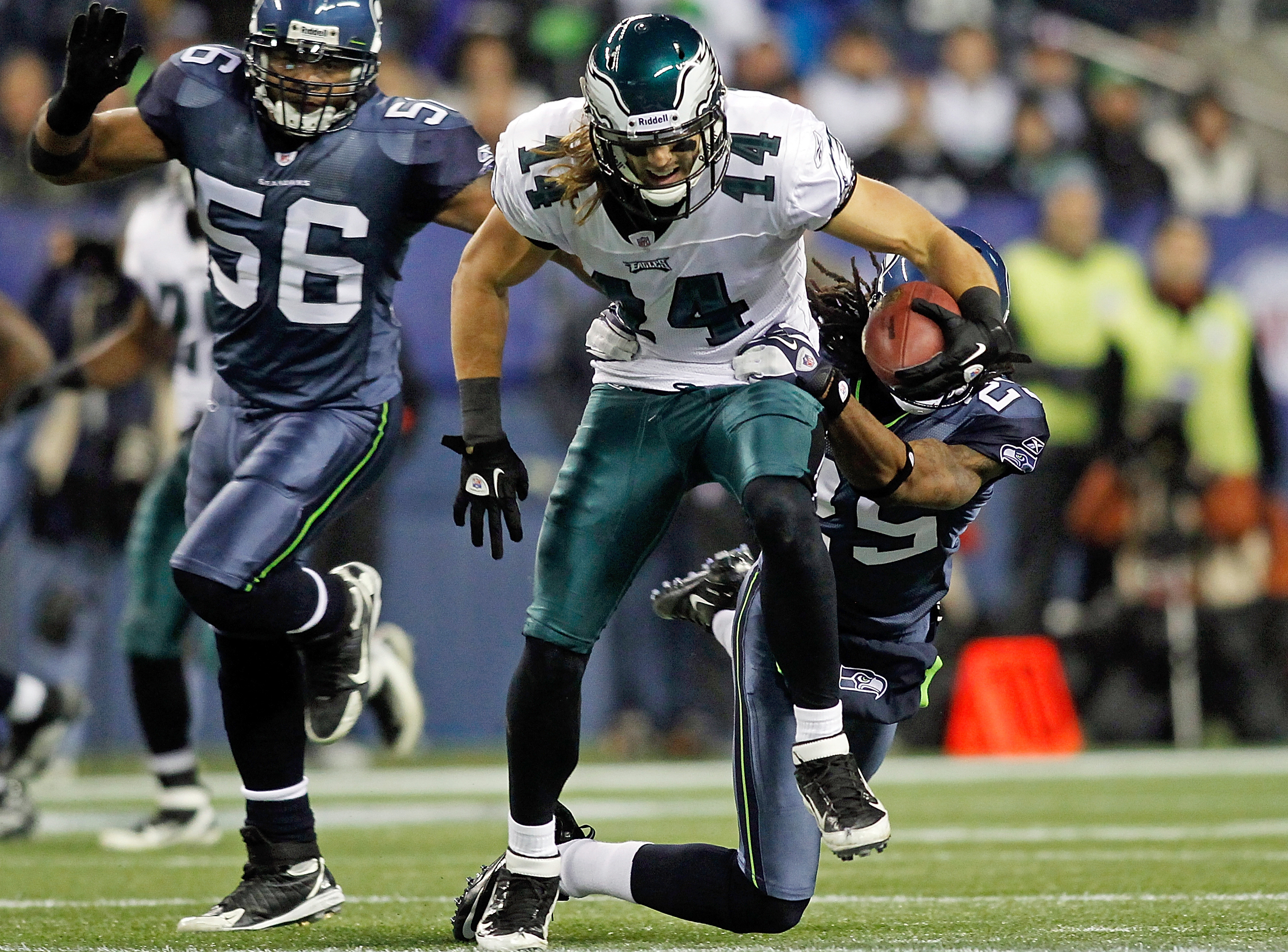 Richard Sherman tackles Riley Cooper in December 2011. (Photo by Jonathan Ferrey/Getty Images)