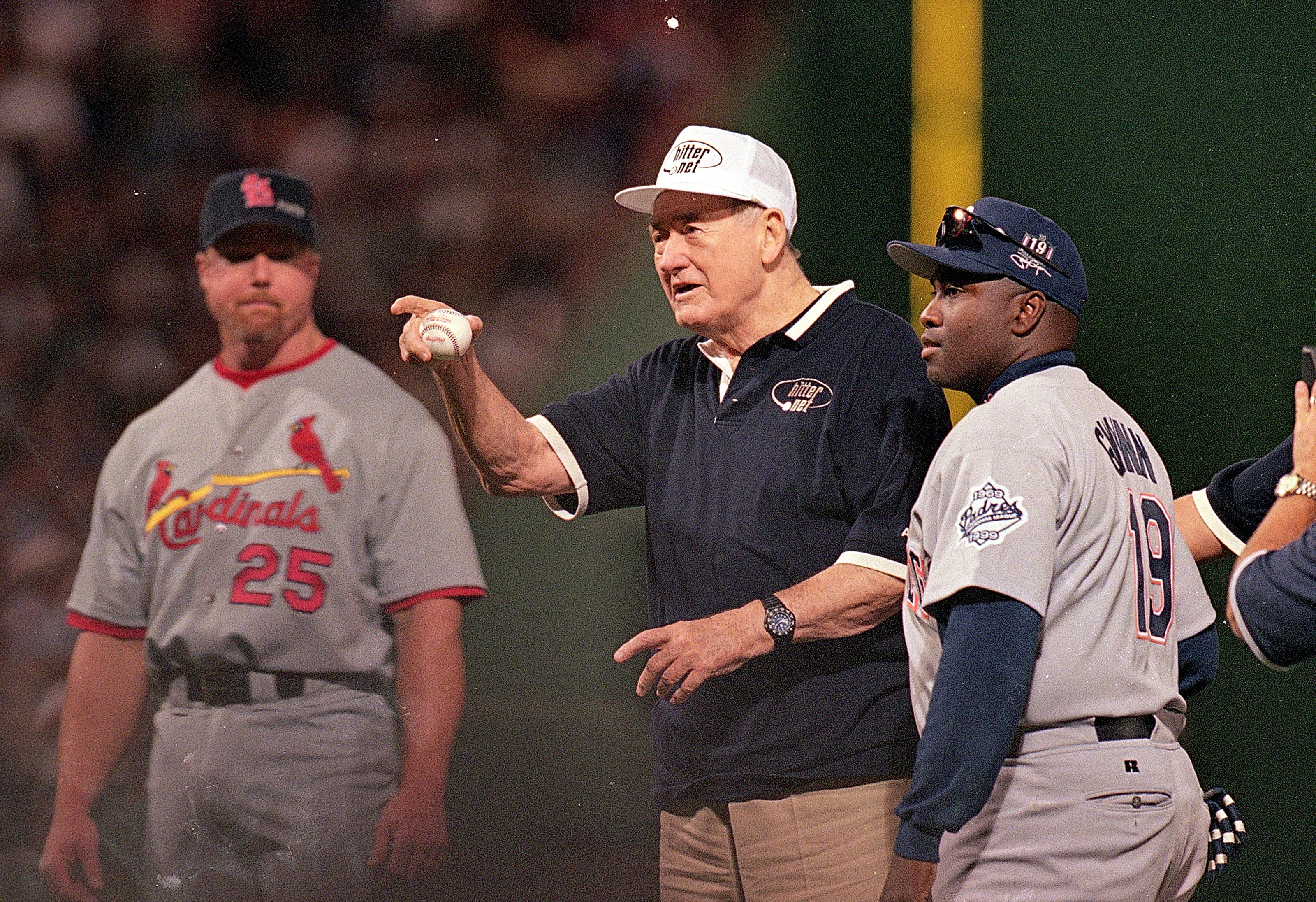 Ted Williams throws out the first pitch as he stands next to Tony Gwynn prior to  the 1999 MLB All-Star Game at Fenway Park. (Credit: Brian Bahr /Allsport)