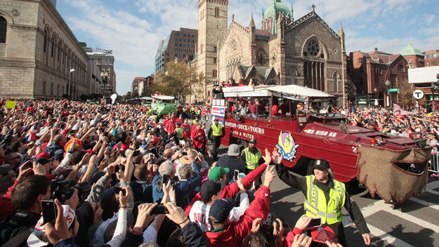Duck boats make their way down Boylston Street where fans gathered for the World Series victory parade for the Boston Red Sox on November 2, 2013. (Photo by Gail Oskin/Getty Images)