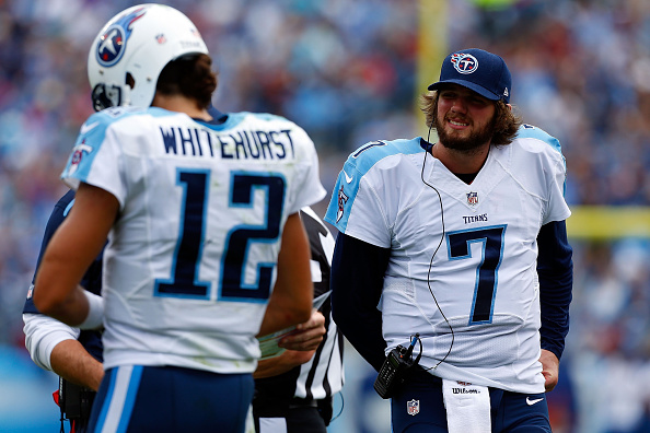 Zach Mettenberger #7 of the Tennessee Titans stands on the sideline with Charlie Whitehurst #12 on October 12, 2014.  (Photo by Wesley Hitt/Getty Images)