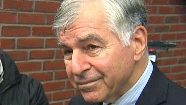 Michael Dukakis talks to reporters outside federal court in South Boston, Oct. 16, 2014. (WBZ-TV)