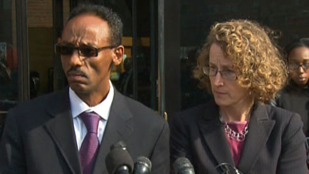 Derege Demissie and Susan Church outside of federal court on Oct. 28. (WBZ-TV)