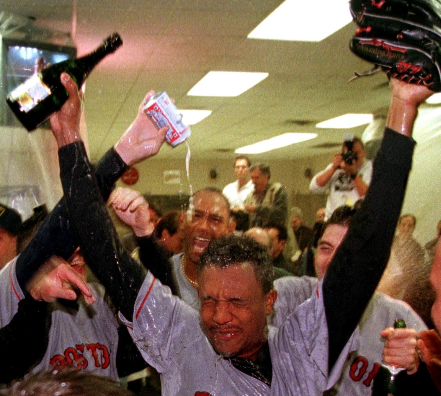 Pedro Martinez celebrates after defeating the Indians in the 1999 ALDS. (Photo by Jeff Kowalsky/AFP/Getty Images)