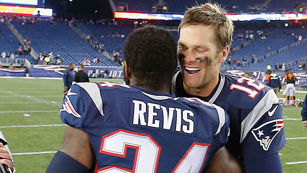 Darrelle Revis and Tom Brady (Photo by Jim Rogash/Getty Images)