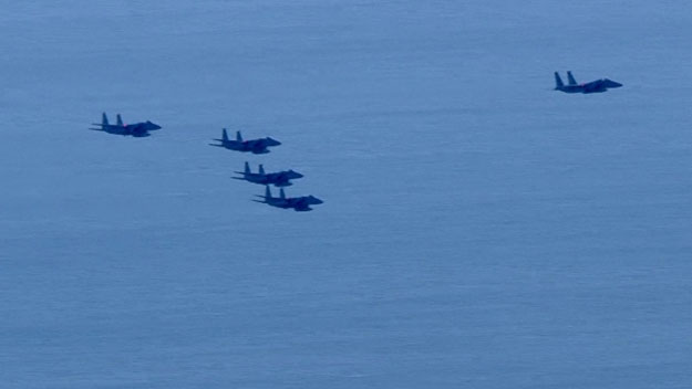 The F-15's flew over Boston around 8:45 a.m. Thursday morning. (WBZ-TV)