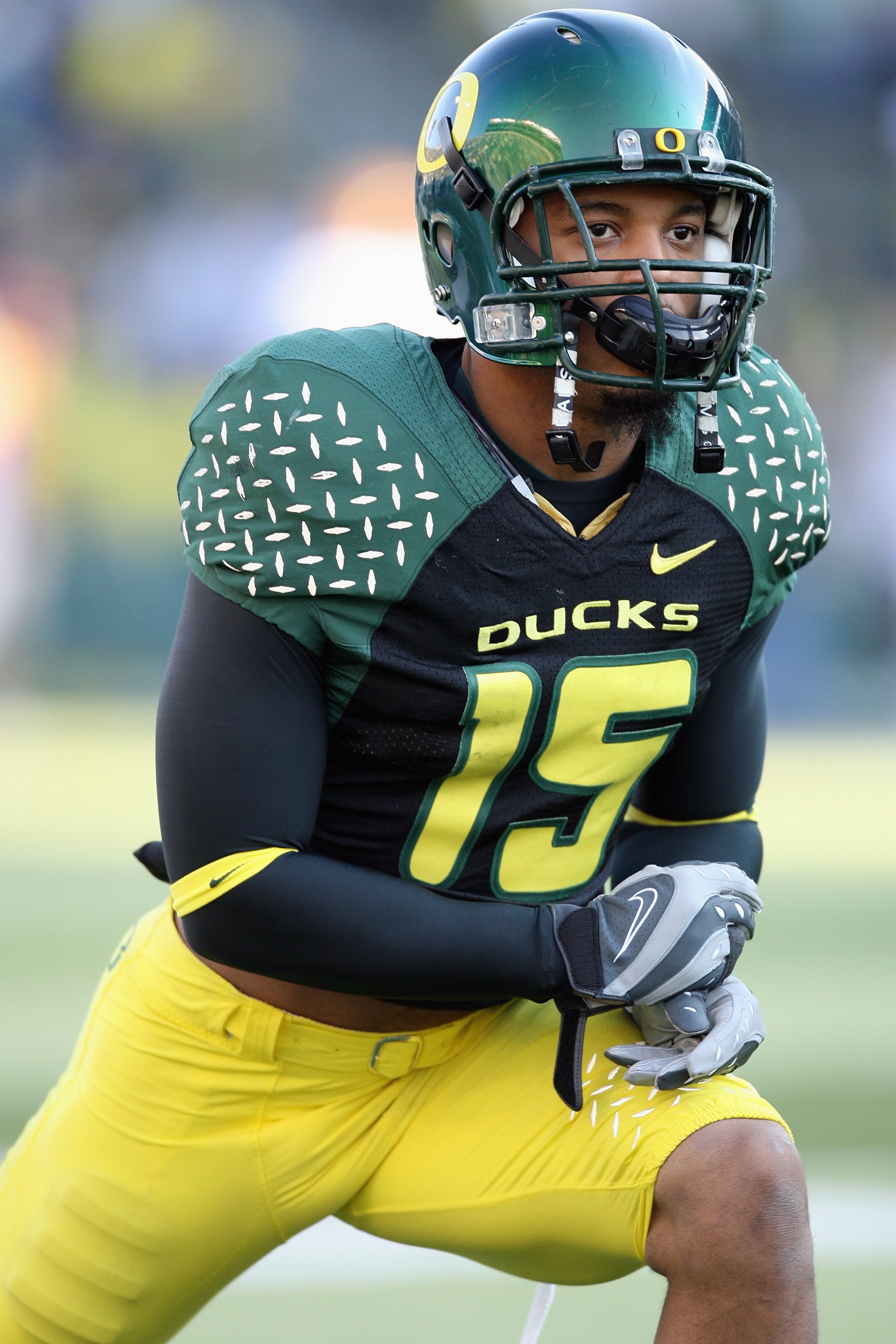 Patrick Chung of the Oregon Ducks stretches before a game against the Arizona State Sun Devils in 2007. (Photo by Otto Greule Jr/Getty Images)