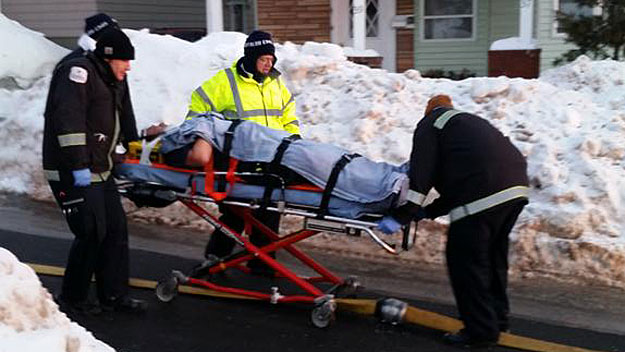 A firefighter was taken away on a stretcher. (Photo by Carl Stevens-WBZ NewsRadio 1030)