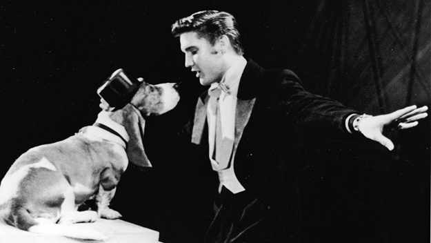 Elvis Presley sings "Hound Dog" in 1956 on the set of The Steve Allen Show. (Photo by NBC Television/Getty Images)