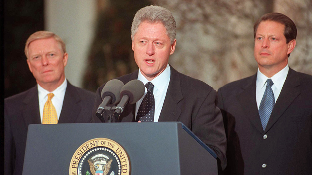President Bill Clinton addresses the nation on Dec. 19, 1998. (Photo by George Bridges/AFP/Getty Images)