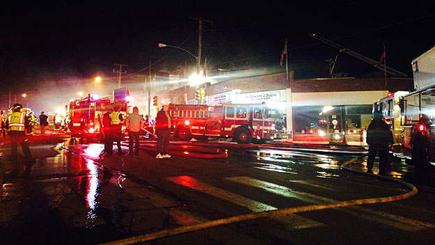 Firefighters knocked down a fire at some Belmont stores Saturday night. (Photo by Julie Loncich/WBZ-TV)