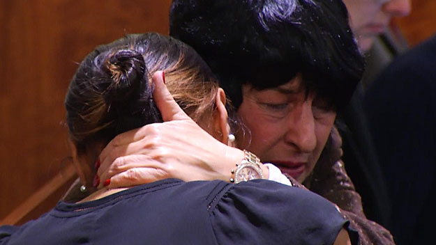 Hernandez's mother, Terri comforts his fiancee, Shayanna Jenkins, after the verdict was read in court. (WBZ-TV)