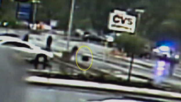 Video shows a Boston terror suspect falling to the ground after being shot (WBZ-TV)