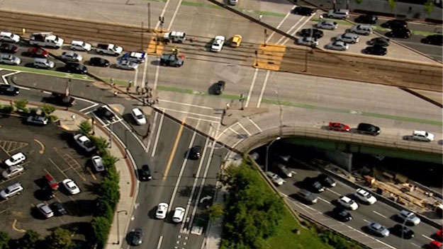 Traffic backed up on Mass. Pike after debris falls from Comm. Ave bridge. (WBZ-TV)