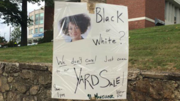 A yard sale sign with an image of American civil rights activist Rachel Dolez on it in the West Roxbury area. (Courtesy photo: @dannypetitt)