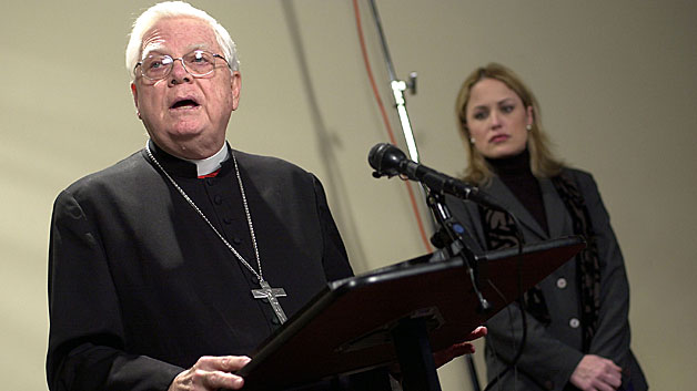 Cardinal Bernard Law announces his resignation as Archbishop of Boston December 16, 2002 at a press conference in Newton. (Photo by Douglas McFadd/Getty Images)