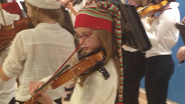 10-year-old Sophie playing the violin. (Paul Burton/WBZ) 