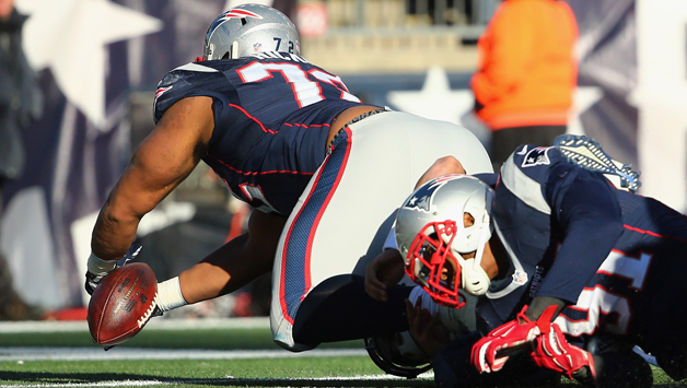 Akiem Hicks recovers a fumble. (Photo by Maddie Meyer/Getty Images)