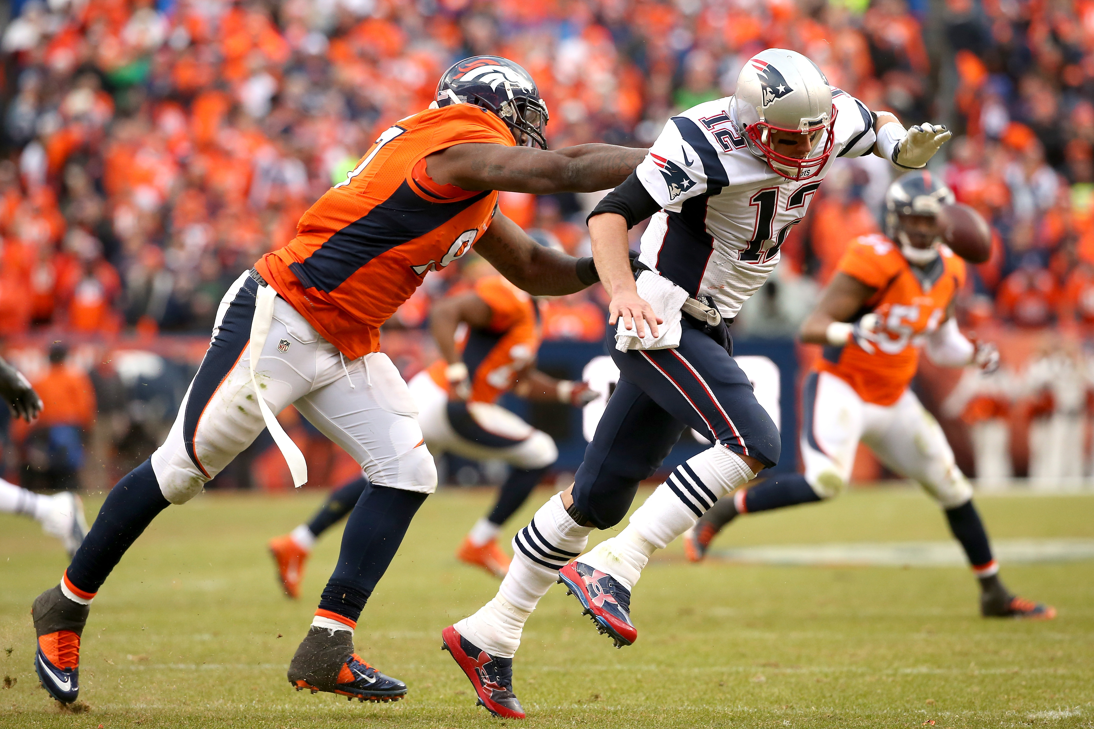Malik Jackson hits Tom Brady. (Photo by Doug Pensinger/Getty Images)