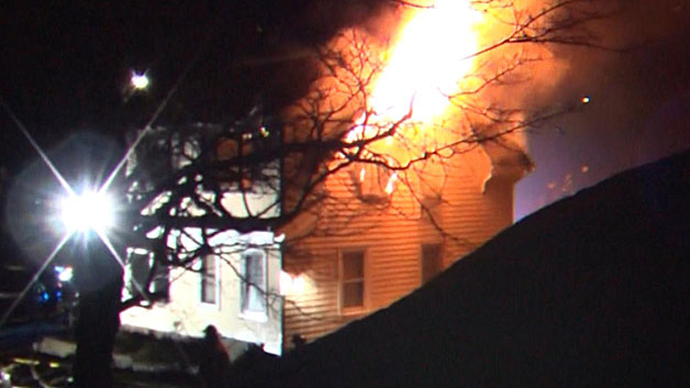 The fire consumed the second floor of the home on Hammond Street. (WBZ-TV)