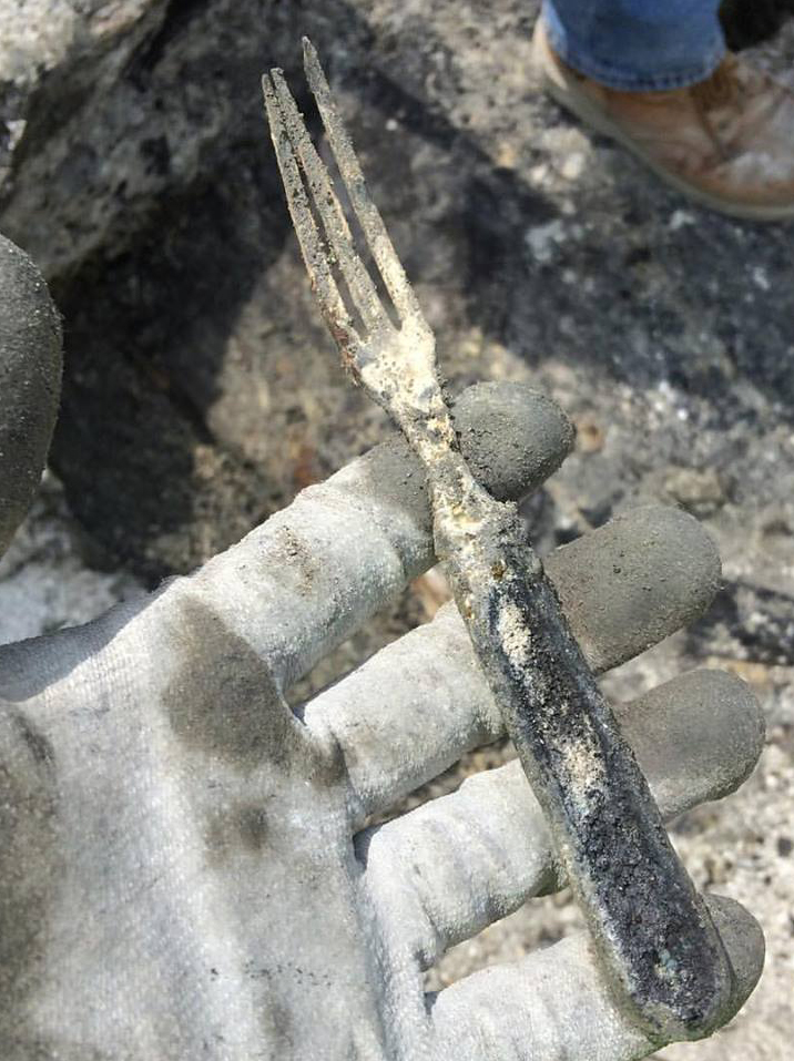 A 19th century fork was found next to a stack of burned dishes in the wreckage of a ship found in the Seaport District. (Image Credit: City Of Boston Archaeology Program)