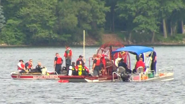 Divers search for man who fell out of kayak in Silver Lake in Halifax (WBZ-TV)