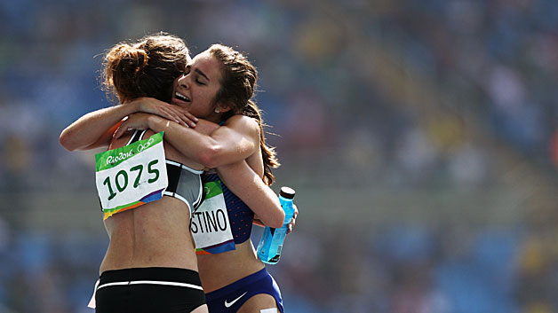 Olympic Runner From Topsfield Competitor Help Each Other Up In