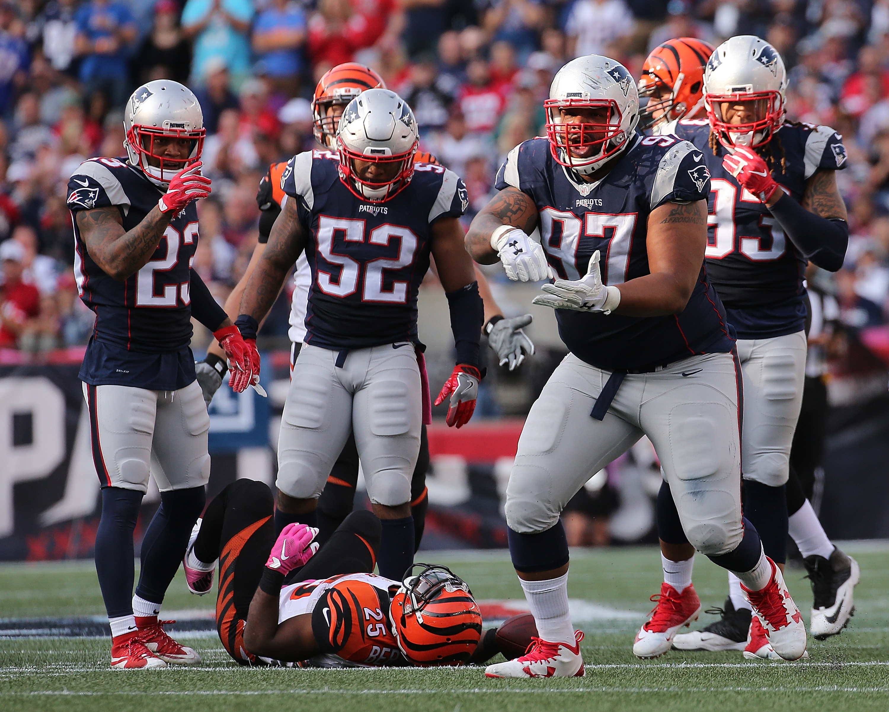 Alan Branch reacts after stopping Giovani Bernard of the Cincinnati Bengals. (Photo by Jim Rogash/Getty Images)
