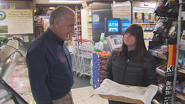 Collette with Stephen DeAngelis, owner of the Golden Goose Market where her cookies are sold. (WBZ-TV)