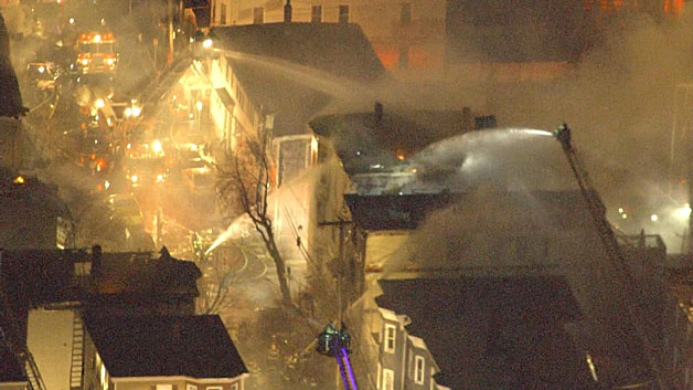 The Red Cross had assisted at least 120 people Saturday after a 10-alarm fire tore through homes. (WBZ-TV)
