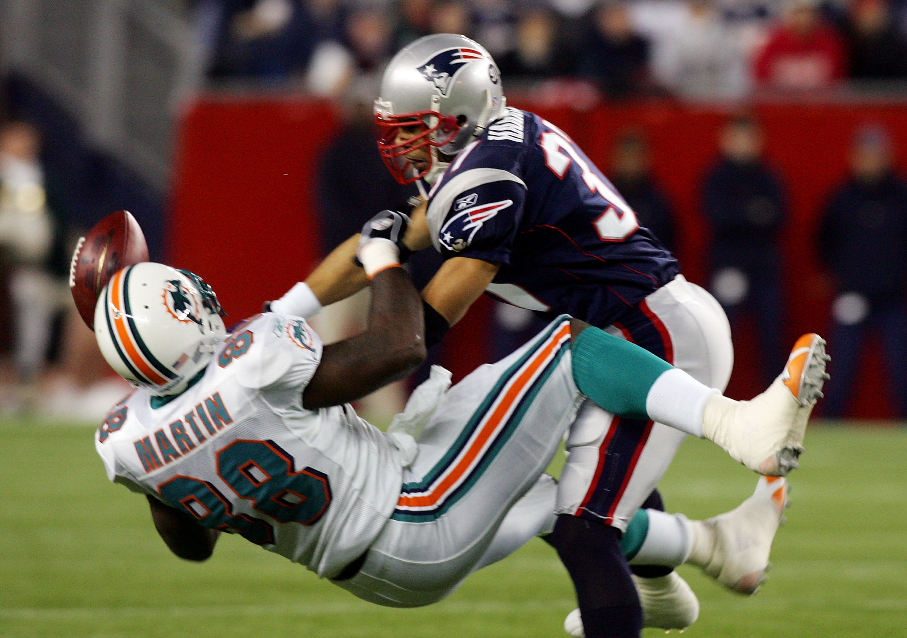 Rodney Harrison of the New England Patriots breaks up a pass intended for David Martin of the Miami Dolphins at Gillette Stadium on December 23, 2007. (Photo by Jim McIsaac/Getty Images)