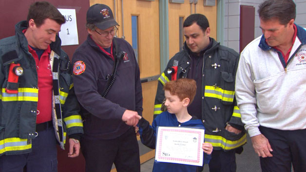 Jacoby Garber is honored by Bedford firefighters (WBZ-TV)