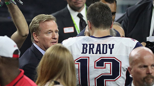 NFL commissioner Roger Goodell speaks to Tom Brady #12 of the New England Patriots after defeating the Atlanta Falcons during Super Bowl 51 at NRG Stadium on February 5, 2017 in Houston, Texas. The Patriots defeated the Falcons 34-28. (Photo by Patrick Smith/Getty Images)