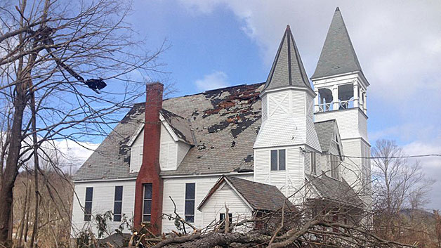 A tornado damaged the roof of a church in Conway, Mass. (Photo credit: Eversource)